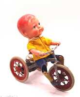TIN AND CELLULOID TRICYCLE BOY