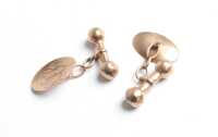 GOLD CUFFLINKS
