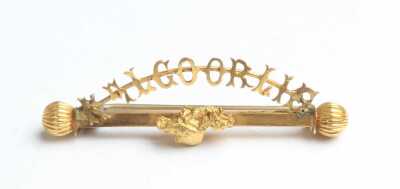 GOLD BROOCH