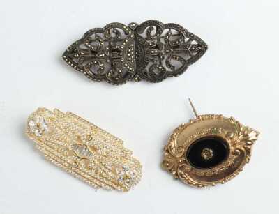 BROOCHES