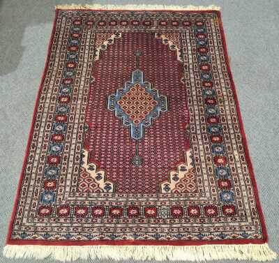 126 · PERSIAN RUG