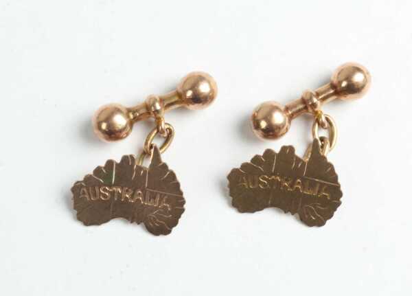 GOLD CUFFLINKS