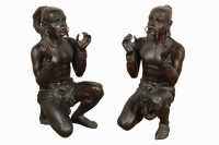 PAIR OF CROUCHING FIGURES