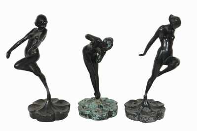Set Of Figural Flower Frogs