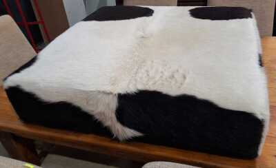 505 · COWHIDE OTTOMAN