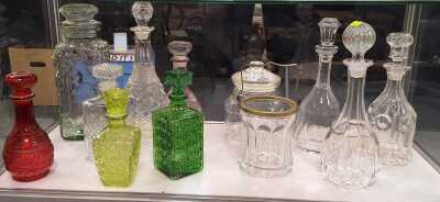 Collection of genie bottles and crystal decanters plus crystal ice box