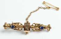 GOLD BROOCH