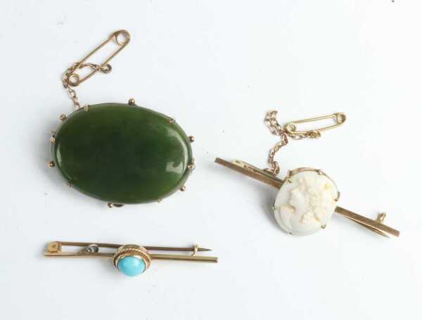 GOLD BROOCHES