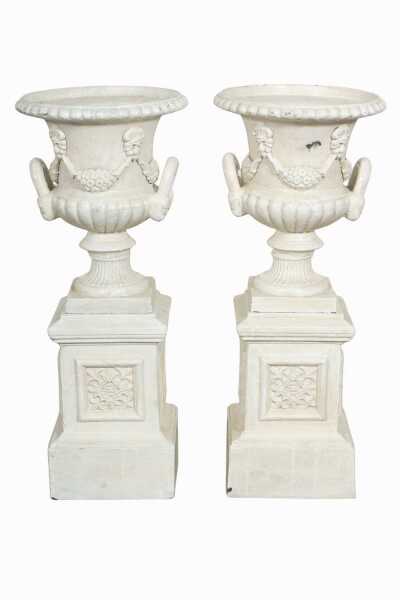 PAIR OF CAST IRON URNS