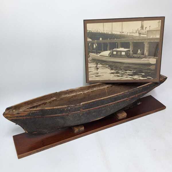 SHIPS HULL AND PHOTOGRAPH