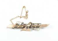 GOLD BROOCH