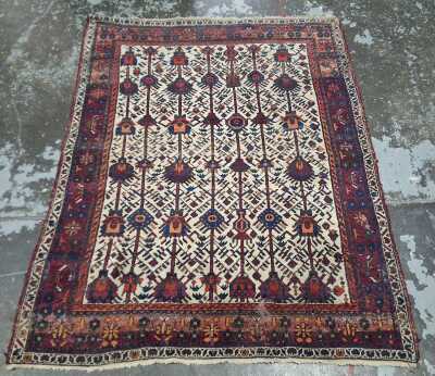 77 · PERSIAN RUG