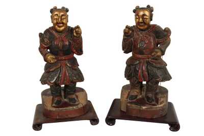 AN OPPOSING PAIR OF CHINESE CARVED FIGURES