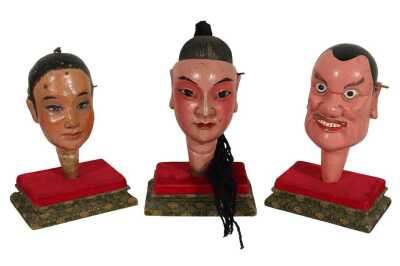 THREE CHINESE PUPPET HEADS