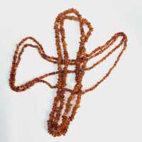 STRANDS OF AMBER