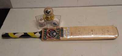 BASEBALLS AND CRICKET BAT