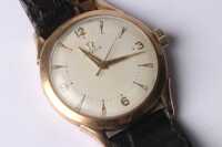 GOLD OMEGA WRISTWATCH