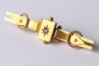 GOLD BROOCH
