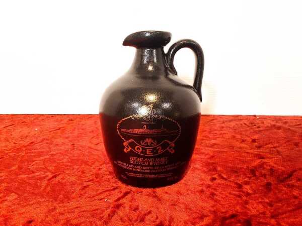 BOWMORE QE2 DECANTER AND WHISKY
