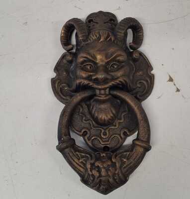DOOR KNOCKER