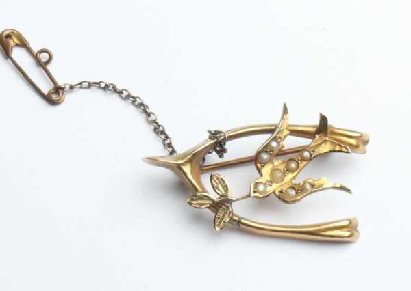 GOLD BROOCH
